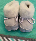White suede baby shoes 